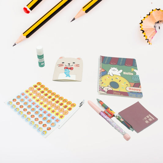 Cartoon stationery box with book, pen, eraser, and more