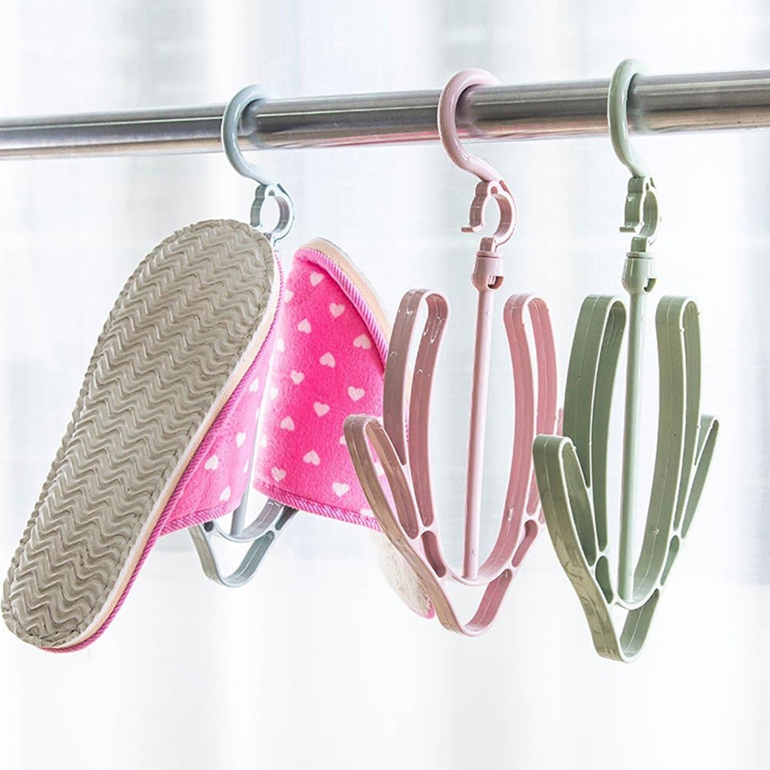 Shoe drying hanger, rotatable and ideal for hanging shoes in various settings.