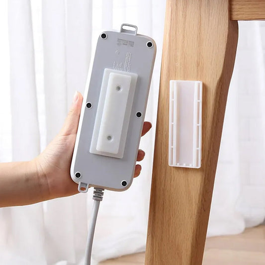 Self-adhesive wall mount plug organizer