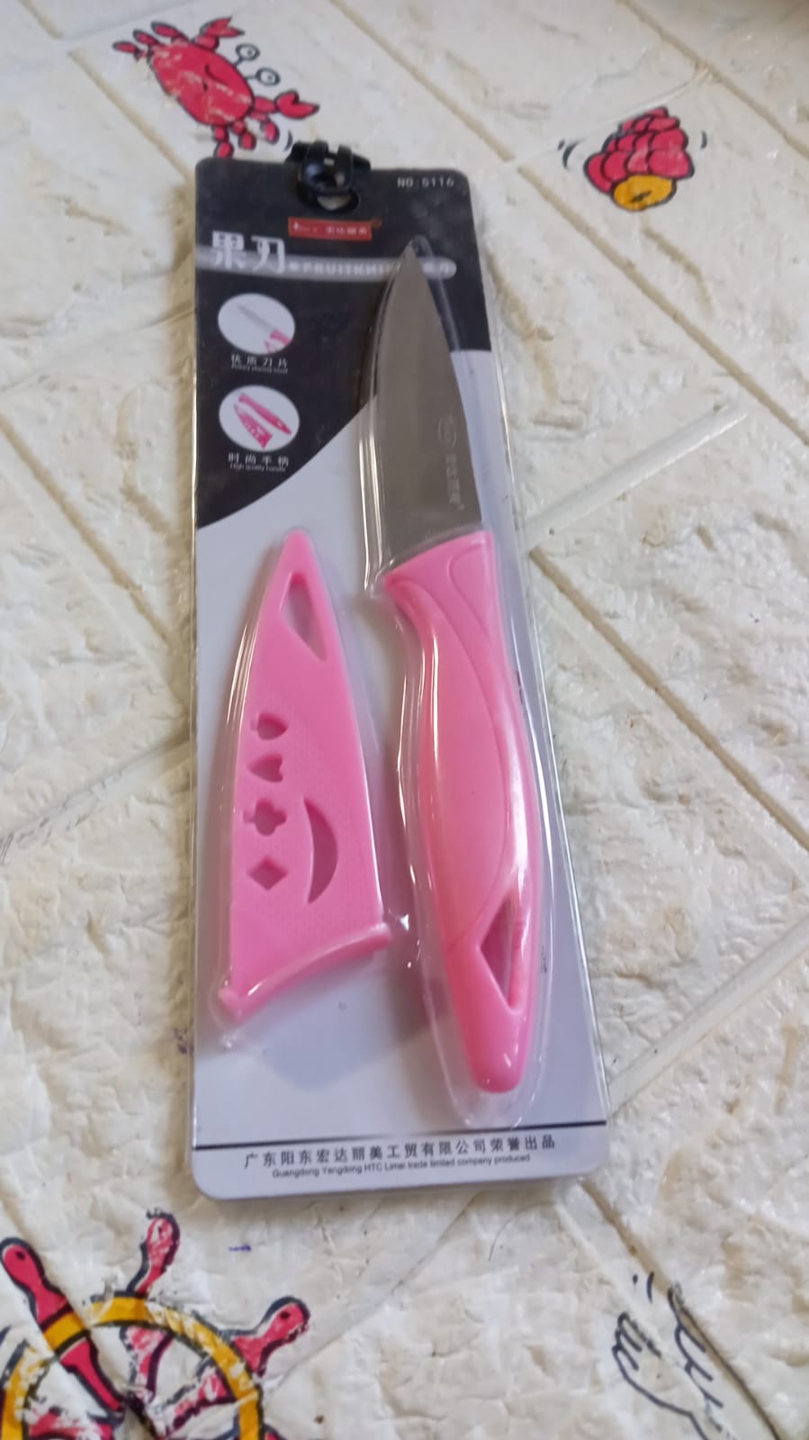 pink colored kitchen knife