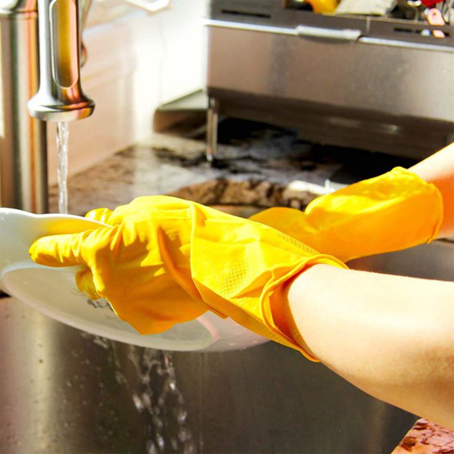 Yellow gloves for washing and cleaning tasks