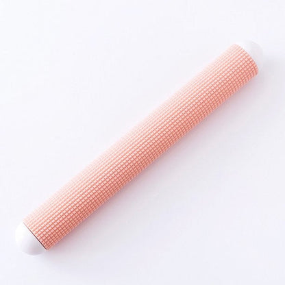 Multicolor plastic acupressure foot roller for relaxation.