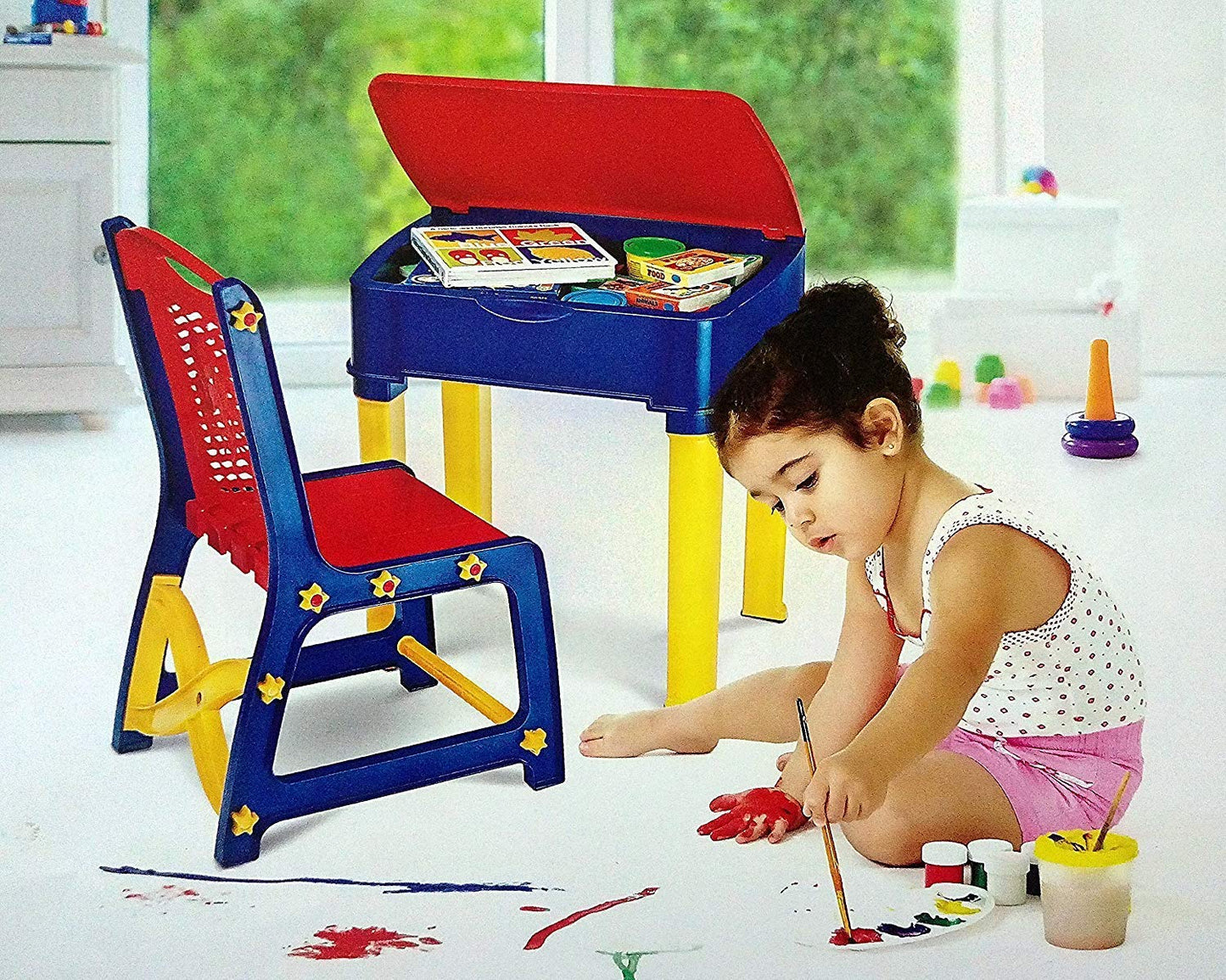 High-quality plastic study table and chair set in pink, includes a small box for pencils.